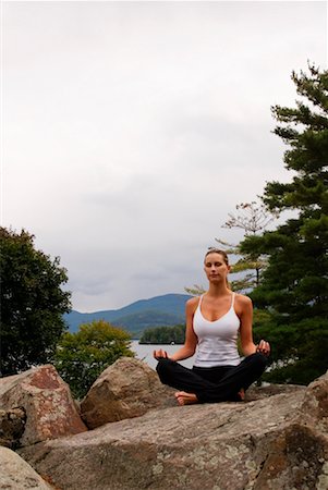 Woman Practicing Yoga Outdoors Foto de stock - Con derechos protegidos, Código: 700-00199088