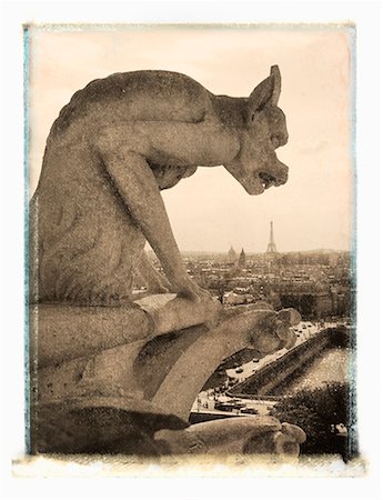 paris sepia - Gargoyle (Chimera) Overlooking Paris from Notre Dame Cathedral France Stock Photo - Rights-Managed, Code: 700-00199426