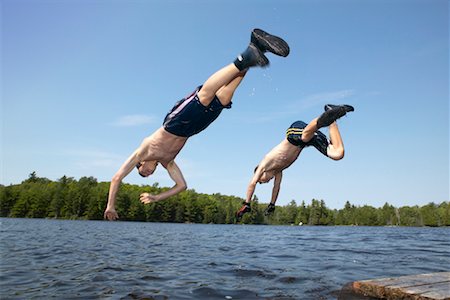 simsearch:700-00611099,k - Boys Diving Off Dock Stock Photo - Rights-Managed, Code: 700-00190392