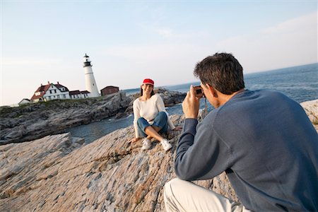 person full body shot crouching - Man Taking Woman's Picture Stock Photo - Rights-Managed, Code: 700-00190618