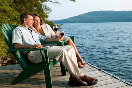 secluded lake woman - Couple Drinking Wine on Cottage Deck Stock Photo - Rights-Managed, Code: 700-00190626