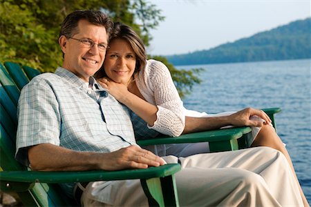 secluded lake woman - Couple in Deck Chairs by Water Stock Photo - Rights-Managed, Code: 700-00190627