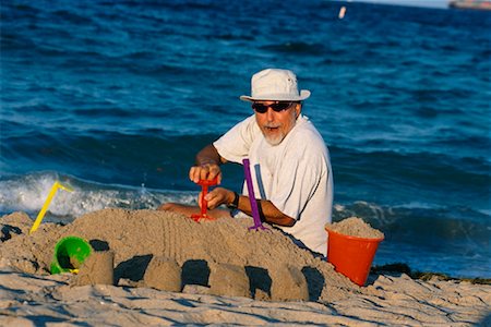 simsearch:700-00190697,k - Man Building Sandcastle Stock Photo - Rights-Managed, Code: 700-00190699