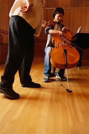 Student Playing Cello for Teacher Stock Photo - Rights-Managed, Code: 700-00190879