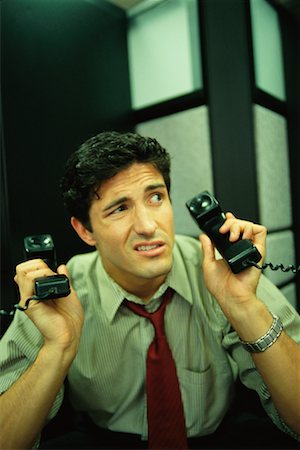 simsearch:700-00088934,k - Businessman with Two Phones Stock Photo - Rights-Managed, Code: 700-00193649