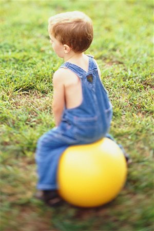 Child Playing Outdoors Stock Photo - Rights-Managed, Code: 700-00193658
