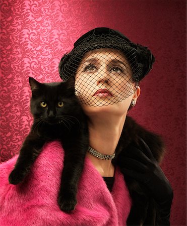 simsearch:700-00027399,k - Woman Wearing Cat as a Stole Stock Photo - Rights-Managed, Code: 700-00193788