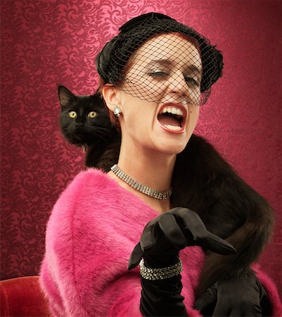 simsearch:700-00027399,k - Woman Growling with Cat Stock Photo - Rights-Managed, Code: 700-00193789