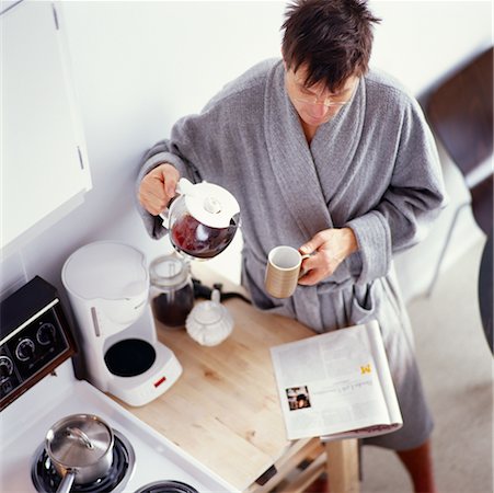 Man Getting his Morning Coffee Stock Photo - Rights-Managed, Code: 700-00268362