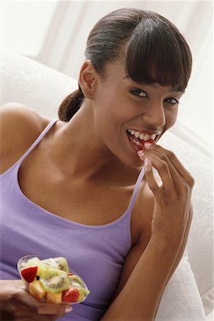 Woman Eating Fruit Stock Photo - Rights-Managed, Code: 700-00268438