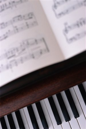 simsearch:6102-03748485,k - Piano Keys and Sheet Music Stock Photo - Rights-Managed, Code: 700-00274909