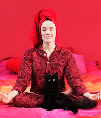 elizabeth knox - Woman Practicing Yoga with Cat Stock Photo - Rights-Managed, Code: 700-00270354