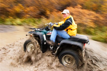 Man Driving an ATV Stock Photo - Rights-Managed, Code: 700-00284828