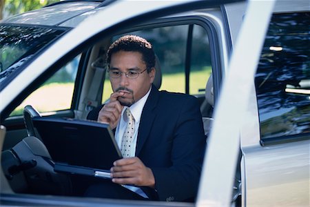 simsearch:700-00281308,k - Man Sitting in Car Using Laptop Stock Photo - Rights-Managed, Code: 700-00285296