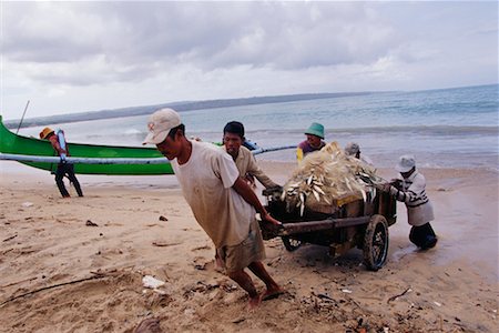 Men Pulling Fish Cart on Beach Bali Indonesia Stock Photo - Rights-Managed, Code: 700-00285405