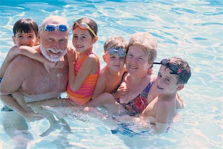 simsearch:700-00046927,k - Family in a Swimming Pool Stock Photo - Rights-Managed, Code: 700-00285906