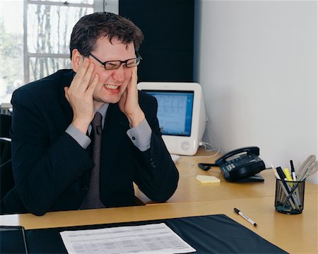 simsearch:700-00088934,k - Business Man with Headache Stock Photo - Rights-Managed, Code: 700-00286261