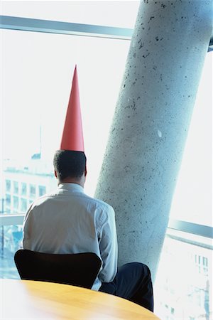 simsearch:700-00078438,k - Businessman with Dunce Cap Stock Photo - Rights-Managed, Code: 700-00286679