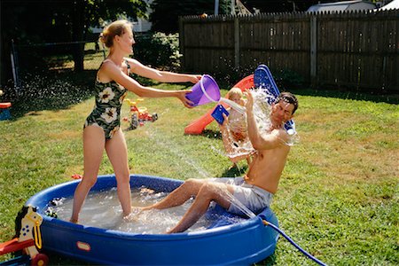 simsearch:700-00280017,k - Couple Playing in a Kiddie Pool Stock Photo - Rights-Managed, Code: 700-00280014