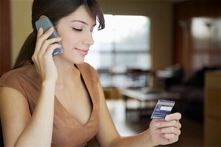 simsearch:700-00695841,k - Woman with Cell Phone and Credit Card Foto de stock - Con derechos protegidos, Código: 700-00280412