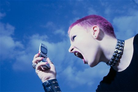 simsearch:700-03290294,k - Woman Yelling into Cell Phone Stock Photo - Rights-Managed, Code: 700-00280689