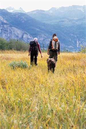 simsearch:700-03814393,k - Couple Hiking with Dog Stock Photo - Rights-Managed, Code: 700-00280806