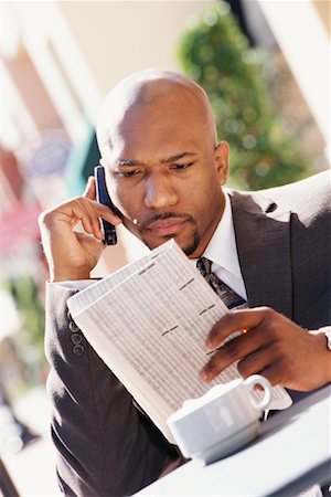 simsearch:700-00281308,k - Businessman with Newspaper and Cell Phone Stock Photo - Rights-Managed, Code: 700-00281304