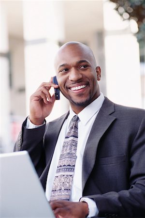 simsearch:700-00281308,k - Businessman with Laptop and Cell Phone Stock Photo - Rights-Managed, Code: 700-00281305