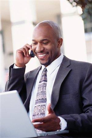 simsearch:700-00281308,k - Businessman with Laptop and Cell Phone Stock Photo - Rights-Managed, Code: 700-00281306