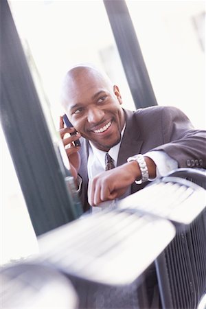 simsearch:700-00281308,k - Businessman Using Cell Phone Stock Photo - Rights-Managed, Code: 700-00281309