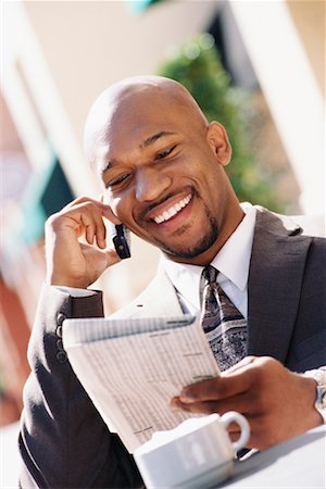 simsearch:700-00163379,k - Businessman with Newspaper and Cell Phone Stock Photo - Rights-Managed, Code: 700-00281303