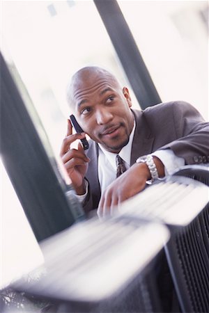 simsearch:700-00281308,k - Businessman Using Cell Phone Stock Photo - Rights-Managed, Code: 700-00281310
