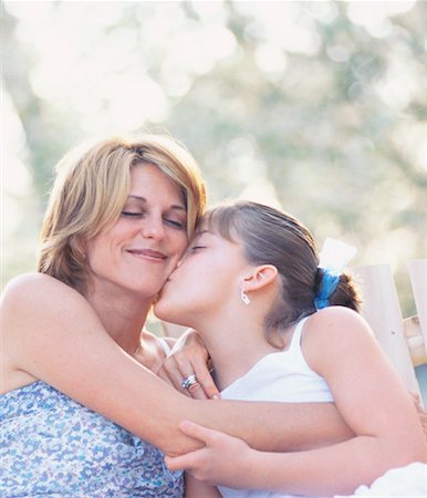 preteen kissing - Mother and Daughter Outdoors Stock Photo - Rights-Managed, Code: 700-00318369