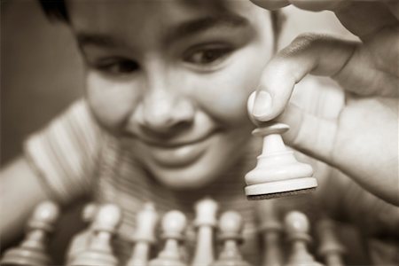 simsearch:700-00075674,k - Girl Playing Chess Stock Photo - Rights-Managed, Code: 700-00328107