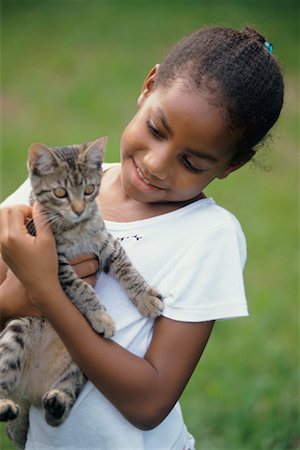 preteen girl pussy - Portrait of Girl with Cat Stock Photo - Rights-Managed, Code: 700-00328379