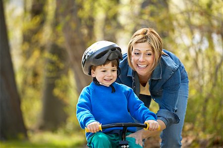 simsearch:700-03067843,k - Mother Teaching Son to Ride Bike Stock Photo - Rights-Managed, Code: 700-00345675