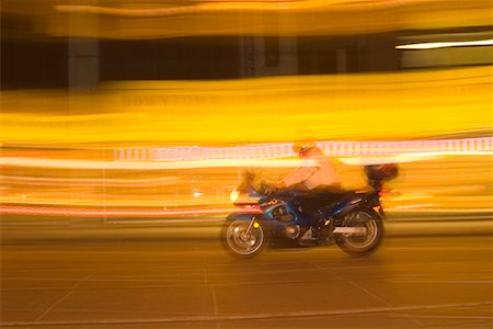 simsearch:700-00189342,k - Speeding Motorcycle Stock Photo - Rights-Managed, Code: 700-00341194