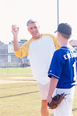 simsearch:700-00097991,k - Boy with Coach on Baseball Diamond Stock Photo - Rights-Managed, Code: 700-00342057