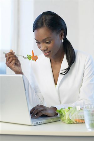 simsearch:700-00515127,k - Woman Eating Salad and Using Laptop Computer Stock Photo - Rights-Managed, Code: 700-00342882
