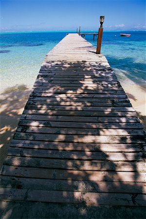 Pier in Huahine Lagoon, French Polynesia Stock Photo - Rights-Managed, Code: 700-00343476