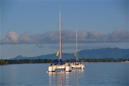 Catamaran Sailboats, Bora Bora, French Polynesia Stock Photo - Rights-Managed, Code: 700-00343470