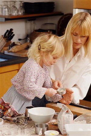 parent child messy cooking - Mother and Daughter Stock Photo - Rights-Managed, Code: 700-00357305