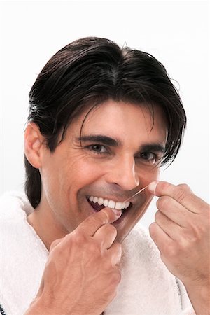 simsearch:700-00350110,k - Man Flossing Teeth Stock Photo - Rights-Managed, Code: 700-00350105