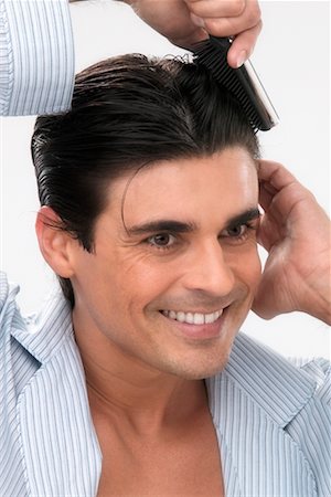 simsearch:700-00350110,k - Man Brushing Hair Stock Photo - Rights-Managed, Code: 700-00350114