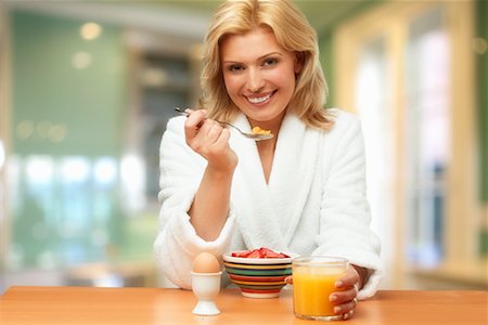 simsearch:700-00515127,k - Woman Eating Breakfast Stock Photo - Rights-Managed, Code: 700-00350135