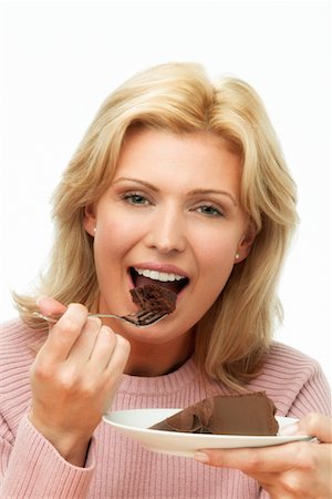 simsearch:700-00477709,k - Woman Eating Cake Stock Photo - Rights-Managed, Code: 700-00350142