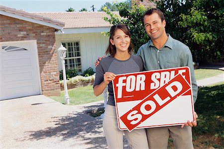 sold sign - Couple Holding Sold Sign Stock Photo - Rights-Managed, Code: 700-00350272