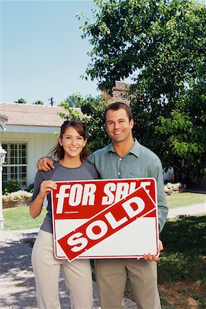 sold sign - Couple Holding Sold Sign Stock Photo - Rights-Managed, Code: 700-00350273