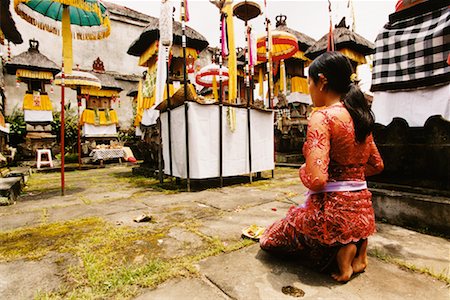 Girl Praying In Temple Penestanan, Bali, Indonesia Stock Photo - Rights-Managed, Code: 700-00364290