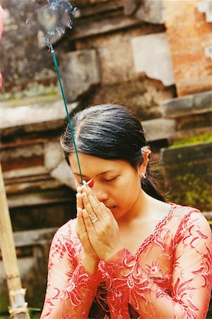 Girl Praying In Temple Penestanan, Bali, Indonesia Stock Photo - Rights-Managed, Code: 700-00364292